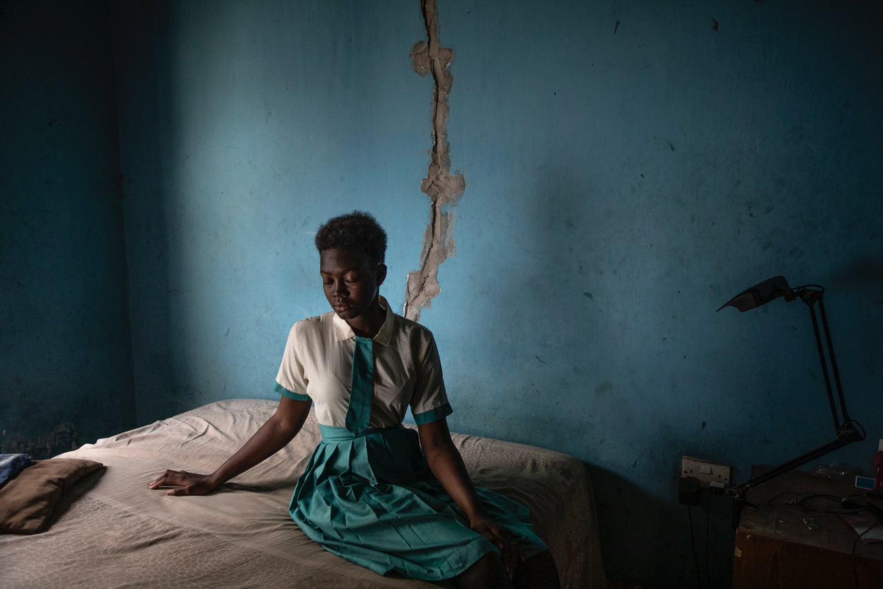 Portrait of Amie Lowe - daughter of Ebou Lowe, a soldier executed on Yahya Jammeh's orders after being accused of a coup attempt, The Gambia, West Africa. Image ©Jason Florio/Helen Jones-Florio
